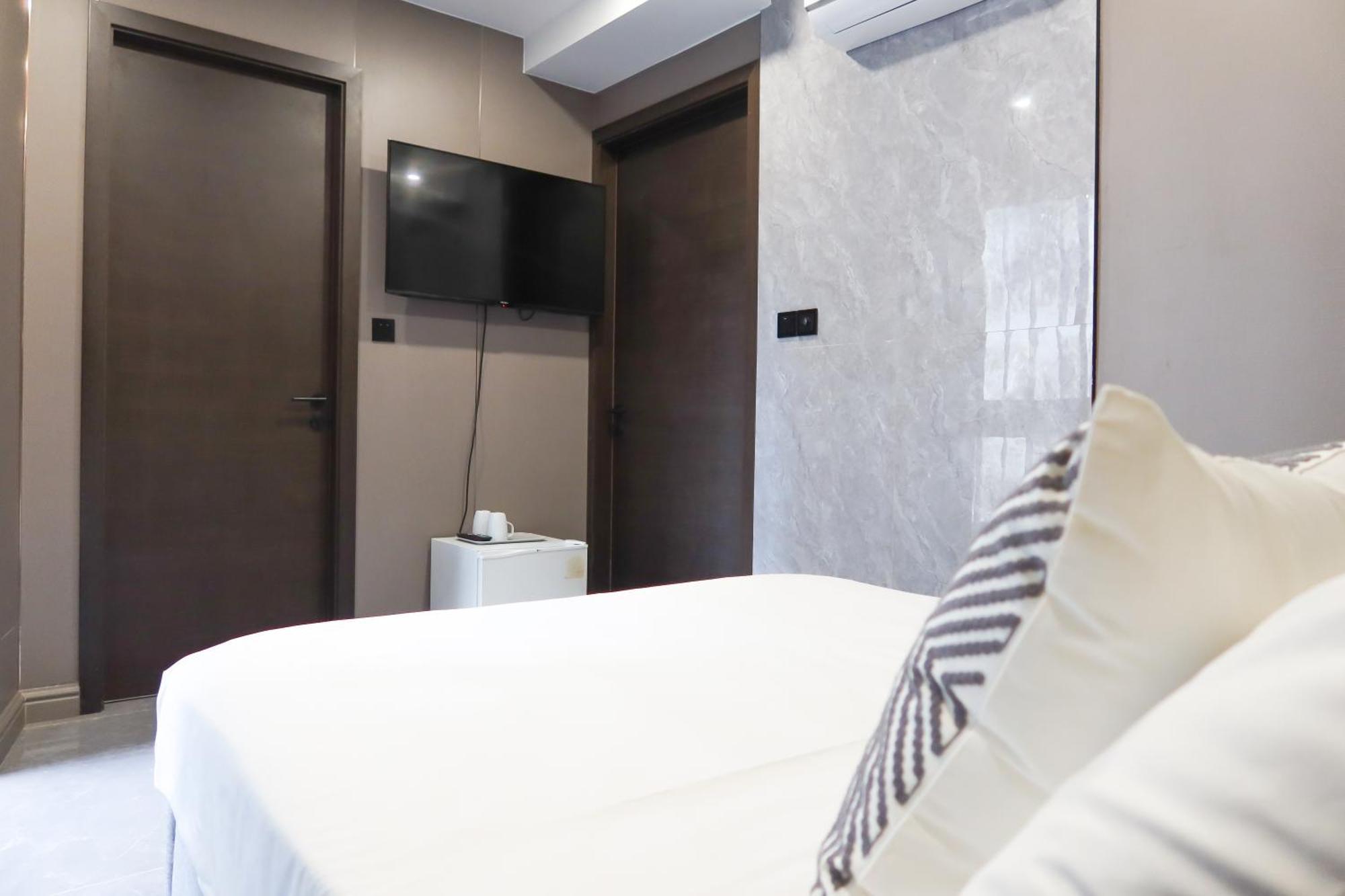 Recharge Studio Apartment & Suites Singapur Oda fotoğraf